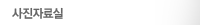ڷ